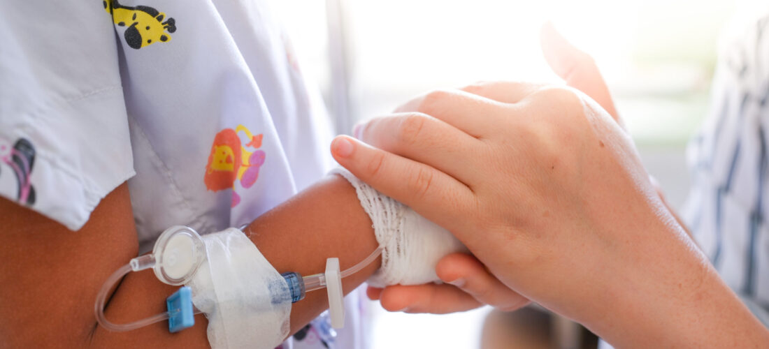 mother-holding-daughter-s-hand-with-drip-infusion mother-holding-daughter-s-hand-with-drip-infusion