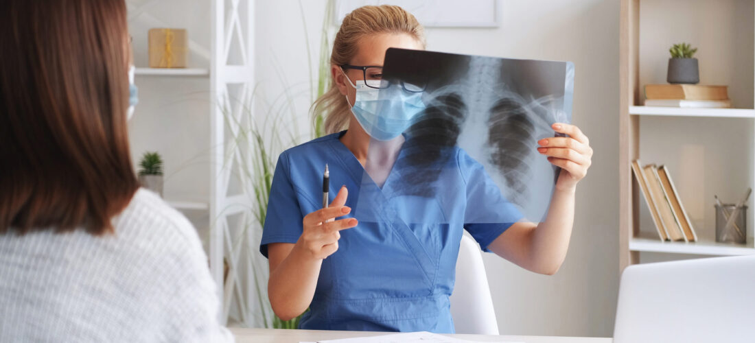 X-ray examination. Skeleton radiology. Woman doctor surgeon holding film scan radiography diagnostic in hospital bone disease treatment.
